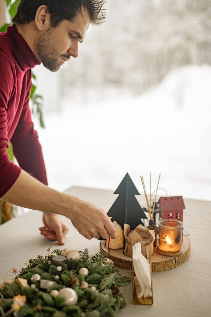 Homemade candles and reed diffusers on a table